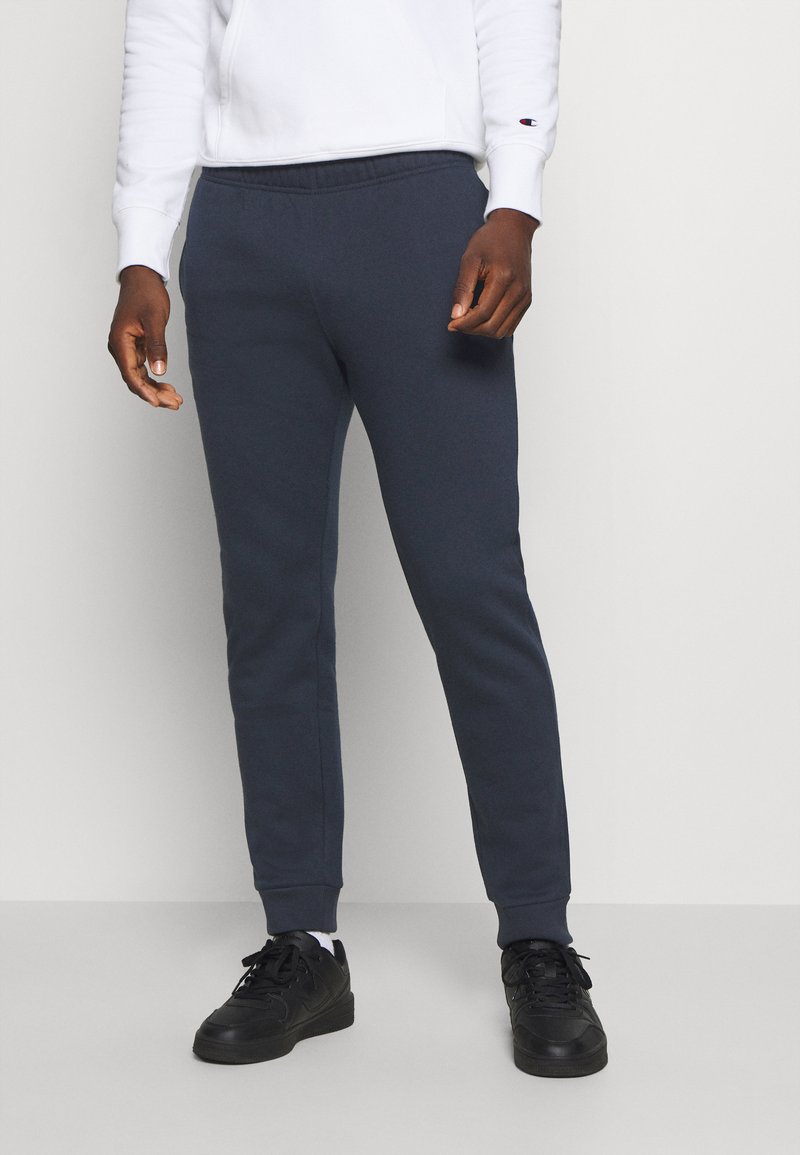 Champion LEGACY CUFF PANTS Tracksuit bottoms dark blue Zalando.ie
