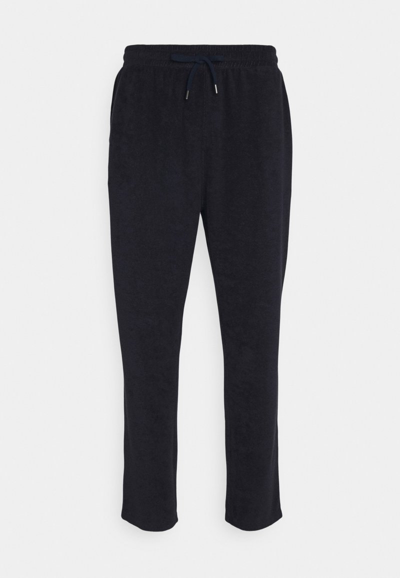 Marina sweatpants gjorda av mjukt tyg, med dragsko i midjan, rak ben-design och avslutade fållar för en avslappnad passform.