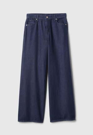 Donkere blauwe denim jeans met wijde pijpen, een gladde textuur, ontwerp met vijf zakken, metalen knoopsluiting en gestikte details langs de naden.