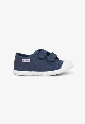 Blue canvas shoes with white rubber sole and toe cap, featuring double Velcro straps and textured upper with accent stripes.