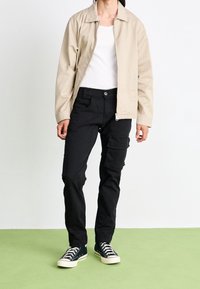 Alpha Industries Kapsáče - black