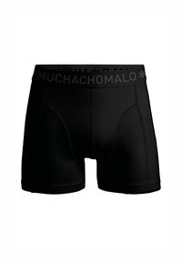 Svarta boxershorts med ett brett, texturerat svart midjeband med varumärkesnamnet "MUCHACHO MALO" i upprepande text. Slät tyg och åtsittande design.