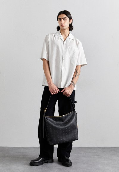 MCM AREN HOBO UNISEX - Saco de mão - black
