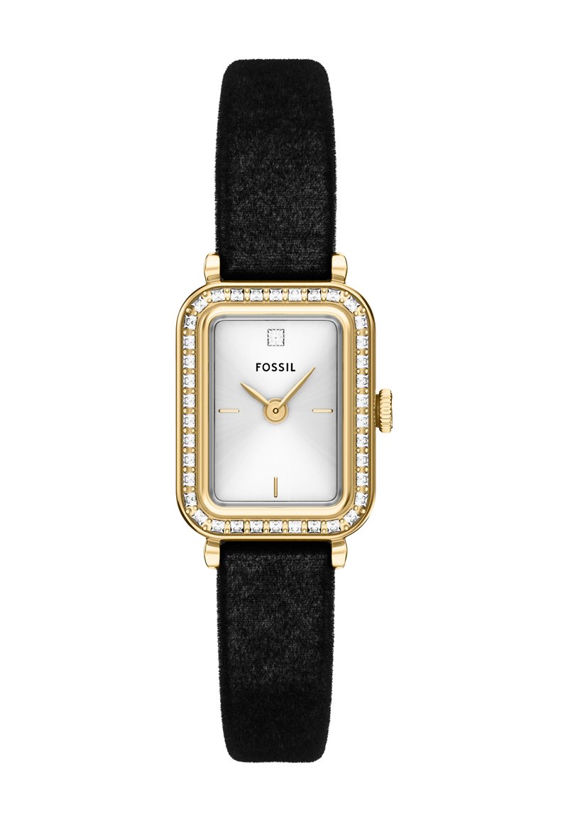 Prostokątny złoty zegarek z białą tarczą, bezel wysadzany kryształkami, minimalne znaczniki godzin, złote wskazówki i czarny materiałowy pasek.