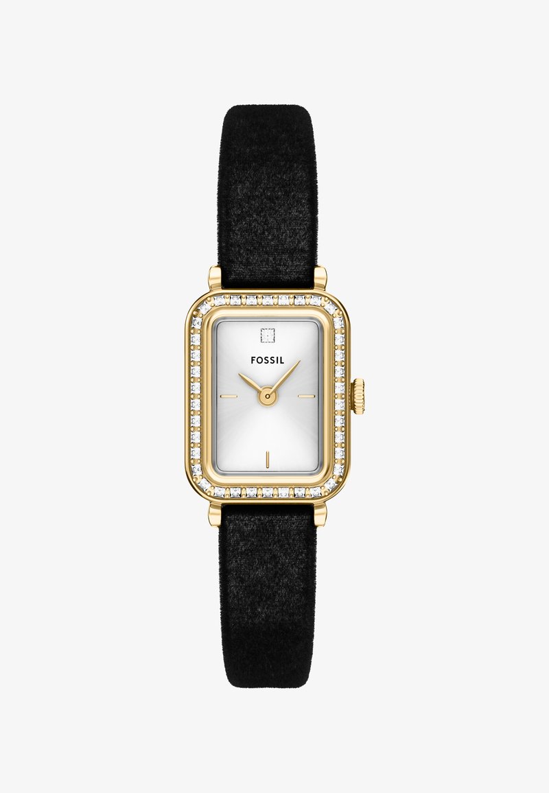 Prostokątny złoty zegarek z białą tarczą, bezel wysadzany kryształkami, minimalne znaczniki godzin, złote wskazówki i czarny materiałowy pasek.