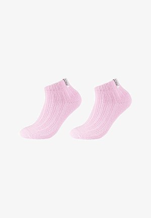 Chaussettes rose à la cheville avec texture côtelée, dotées d'un orteil et d'un bord renforcés, ainsi qu'une petite étiquette logo à l'arrière.