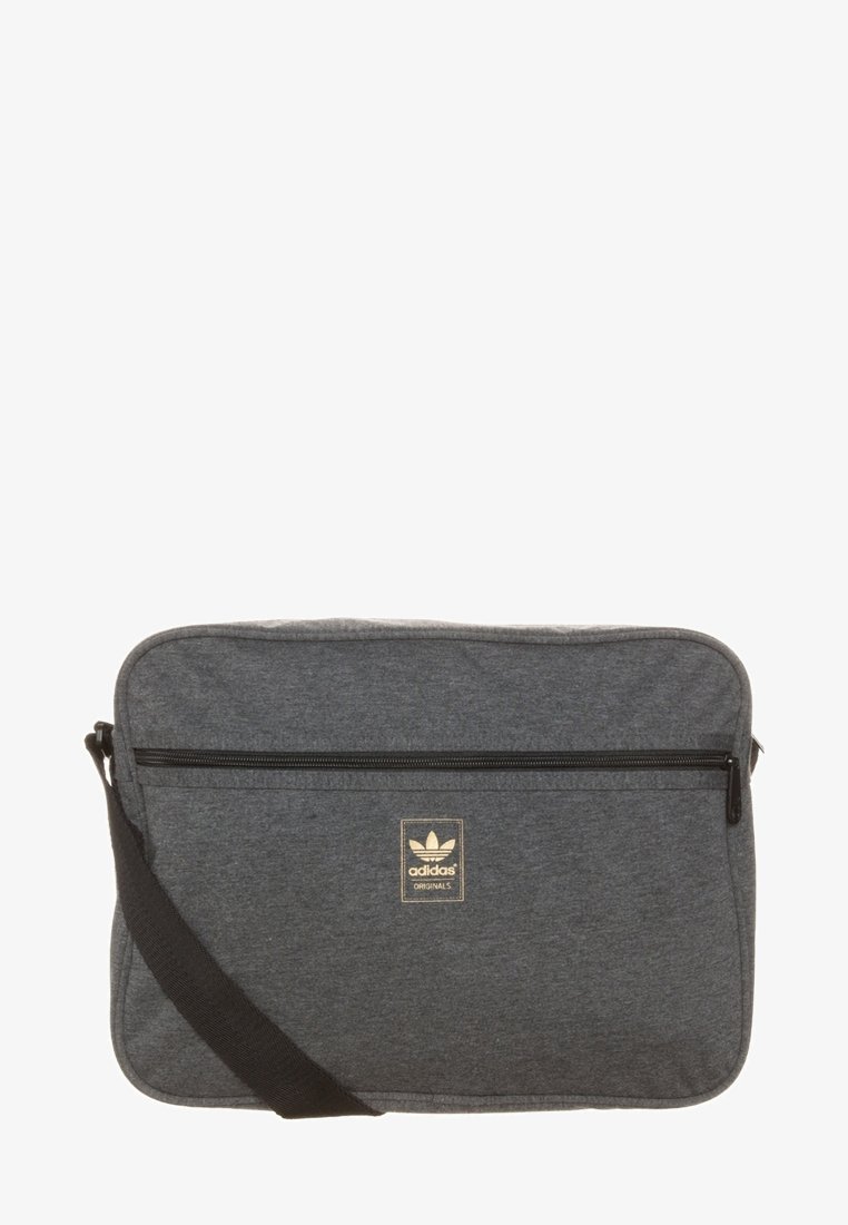 Mörkgrå Adidas Originals axelväska med svart justerbar rem och framficka med dragkedja.