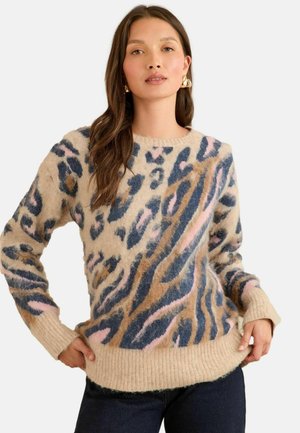 Strickpullover in Beige mit blauem, braunem und rosanem Leopardenmuster. Mit Rundhalsausschnitt, gerippten Bündchen und Saum. Weiche Textur.