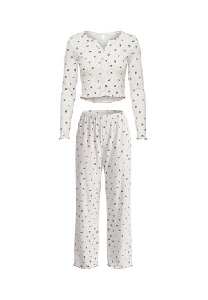 Ensemble de pyjama blanc comprenant un haut court à manches longues et un pantalon ample. Les deux pièces sont ornées d'un motif de cerises rouges et d'une bordure festonnée.