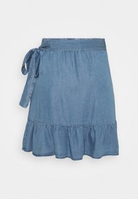 Denim wrap skirt in light blue with ruffled hem, featuring a tie closure and elastic waistband for adjustable fit. Smooth texture.
