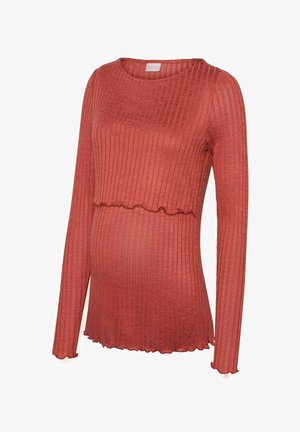 Dolga majica za materinstvo v rjavi barvi, rebrasta tekstura, z valovitim robom in prilegajočo zasnovo, ki prilagaja naraščajočem trebuhu.