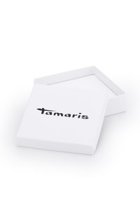Witte rechthoekige doos met een deksel, met een vlakke oppervlakte, een gladde textuur en een zwart "Tamaris" logo op de bovenkant.