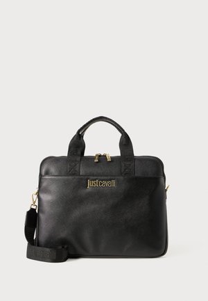Black synthetic bag with dual handles and detachable shoulder strap. Features embossed logo and gold-tone hardware. Smooth texture.