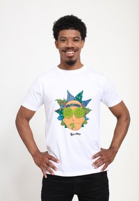 White cotton t-shirt featuring a colorful graphic of a cartoon face with green sunglasses and floral accents, with "Rick and Morty" text.