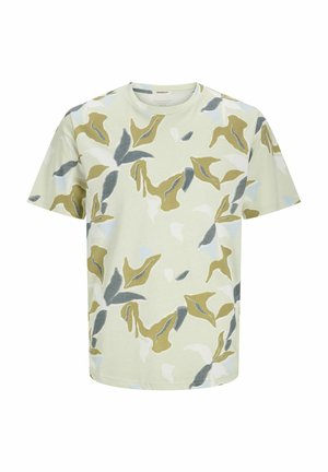 T-shirt vert clair à manches courtes avec un motif de feuilles en olive, bleu marine et blanc. Matériau en coton doux avec une coupe décontractée.