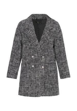 Dupla soros blézer texturált fekete-fehér szövettel. Revers gallérral és két díszítő gyöngy gombbal az elején.