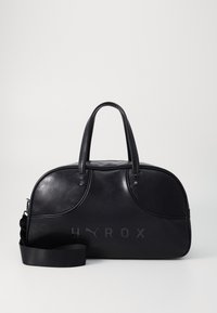 Sort læder rejsetaske med rund form, dobbelthåndtag og justerbar skulderrem. Har prægede "HYROX" logo foran.