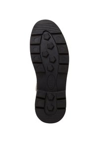 Semelle de chaussure en caoutchouc noir avec un motif texturé comportant des crampons hexagonaux et rectangulaires pour une meilleure adhérence. Logo circulaire et taille 37 marqués.