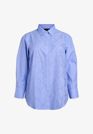 Helehall triibuline nööpidega särk kraega, esiküljel dekoratiivsete hõbedaste ringikujuliste lõigetega. Pika varrukaga, mansetid nööpidega.