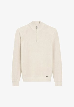 Jasno beżowy sweter z dzianiny z wysokim kołnierzem i krótkim zamkiem błyskawicznym. Posiada ściągacze przy mankietach i dolnym końcu, prezentując teksturowany wzór.