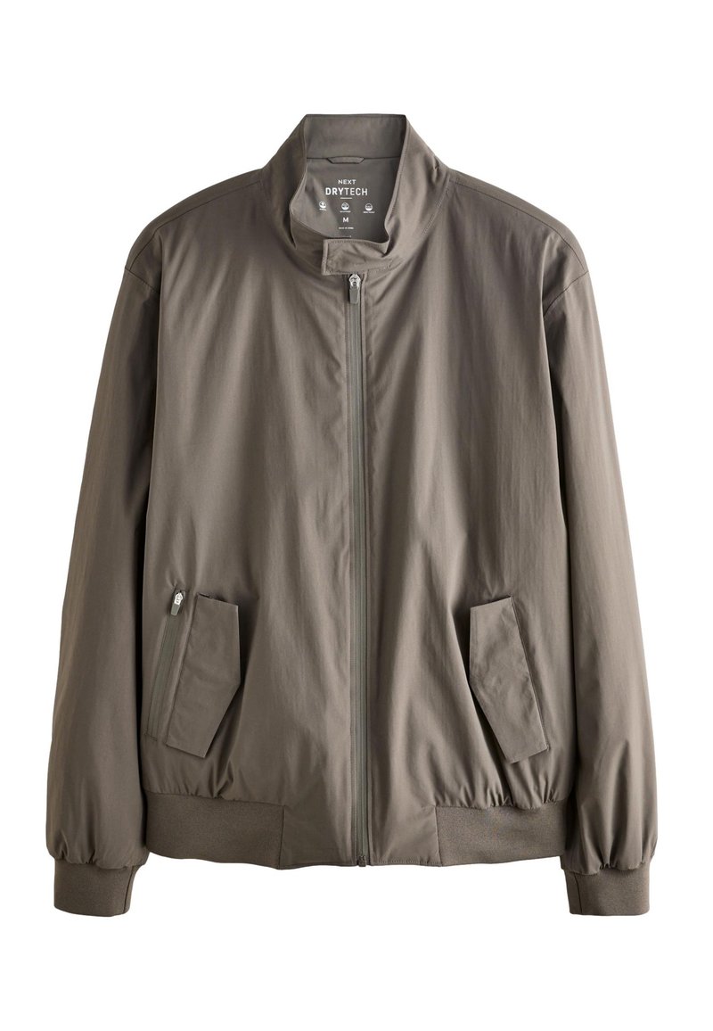 Veste marron zippée avec col haut, deux poches avant à rabat, poignets élastiques et taille élastique, fabriquée en tissu Next Drytech.