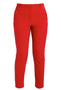 Červené dámské kalhoty slim fit s poutky na pásek a předními švy, vystavené na bíl�ém pozadí.