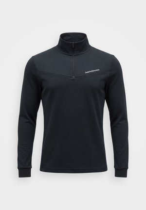 Pullover nero a maniche lunghe con mezza zip, collo alto e piccolo logo "Peak Performance" sul petto.