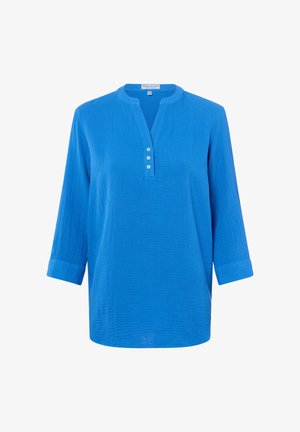 Felblauwe blouse met lange mouwen, drie witte knopen en een afgeronde V-hals, gestructureerde stof en mouwen met manchetten.