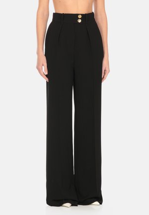 IN CREPE - Pantaloni - black