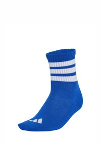 Chaussette en coton bleu avec des rayures blanches en haut. Bords ribés, hauteur moyenne, texture lisse, et un petit logo près des orteils.