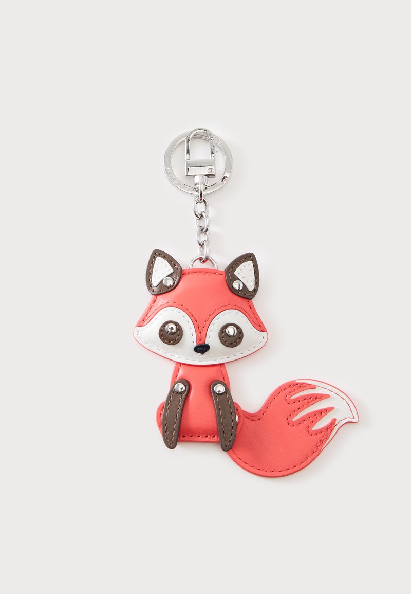 Porte-clés avec un motif de renard rouge et blanc, présentant de grands yeux, des oreilles et des pattes marron, ainsi qu'une queue touffue à pointe blanche.