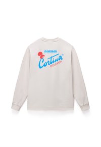 Κρεμ μπλούζα με μακρύ μανίκι, με μια πολύχρωμη γραφική απεικόνιση στην πλάτη που γράφει "Κορτίνα" και "Δολομίτες". Μαλακό βαμβακερό υλικό, κλασική εφαρμογή.