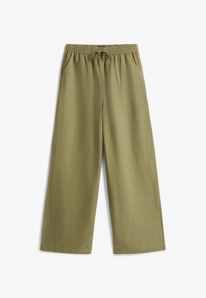 Light olive green wide-leg pants with elastic waistband and drawstring, side pockets, and small brand logo on right hip.
