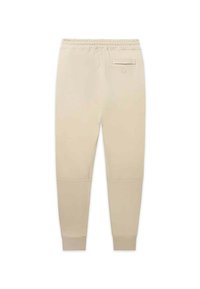 Pantaloni de trening bej, cu o croială slim fit, talie elastică și manșete. Dispune de un buzunar pe spate și detalii de cusătură la picioare. Textură netedă.