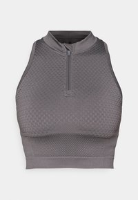 Siv športni crop top z zadrgo na vratu, teksturiranim vzorcem, prilegajočim oblikovanjem ter gladkim zaključkom na robu in armholes.
