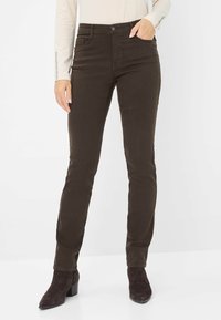 Donkerbruine, slim-fit broek gemaakt van zachte, rekbare stof. Heeft vijf zakken, een knoopsluiting en een enkellange pasvorm.