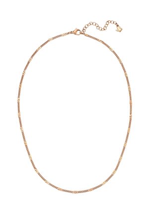 Collier délicat en chaîne d’or avec fermoir mousqueton et rallonge réglable se terminant par un petit pendentif en forme de cœur sur fond blanc.