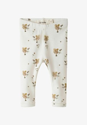 Leggings blancs avec un motif floral, présentant des fées et des abeilles illustrées, texture douce, taille élastique et ourlets cousus.