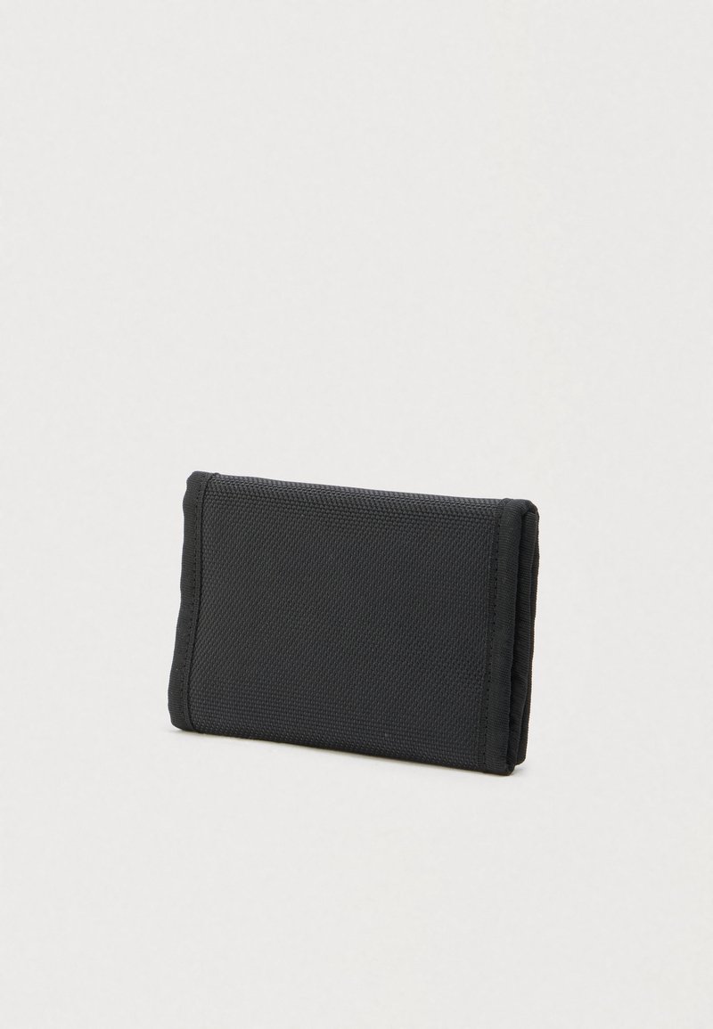 Black fabric wallet folded closed, standing upright on a plain white background.