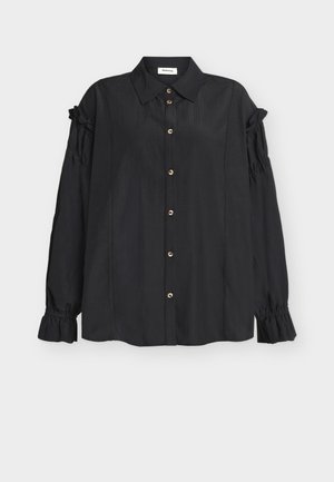 Bluza neagră cu mâneci lungi, cu guler, nasturi în față, detalii strânse pe mâneci și manșete cu volane, așezată plat pe un fundal deschis.