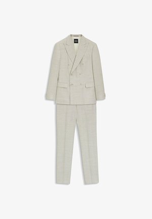 Light beige double-breasted blazer with matching tailored trousers, featuring notched lapels and flap pockets, laid flat on white background.