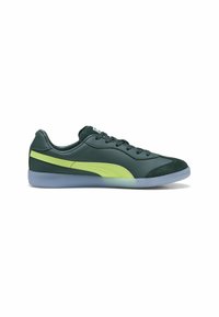 Roheline nahast sneakers kollaste aktsentidega, ümar varvas ja tekstuuriga kummitald, millel on läbipaistev sinine detail.