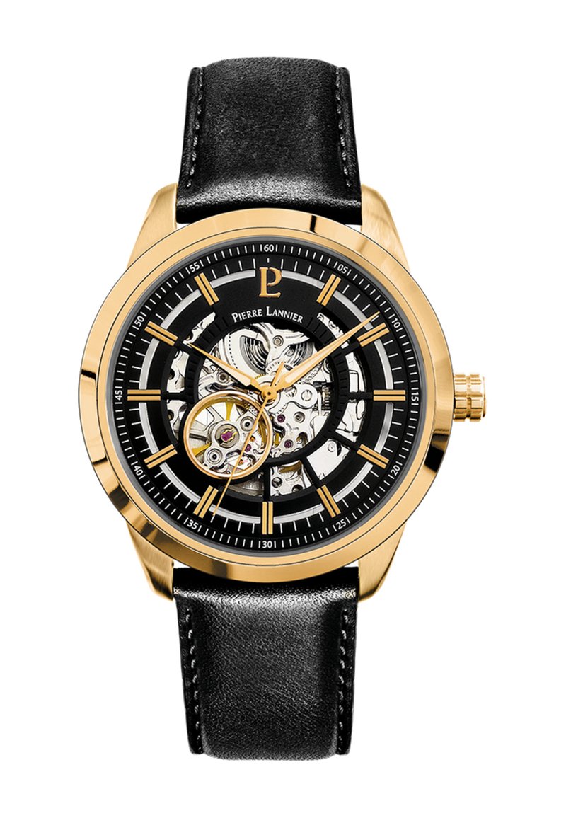 Montre dorée avec un bracelet en cuir noir, cadran mécanique transparent, aiguilles et index dorés sur fond noir.