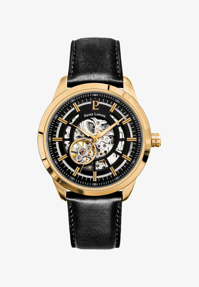 Auksinės spalvos laikrodis su juodu odiniu dirželiu, skaidriu mechaniniu ciferblatu, auksinės spalvos rodyklėmis ir valandų žymėjimu juodoje fone.