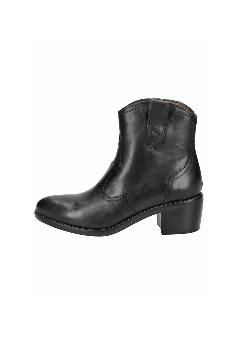 Bottine en cuir noir avec un bout arrondi, un petit talon carré, une fermeture éclair sur le côté et des détails de couture discrets le long des coutures.