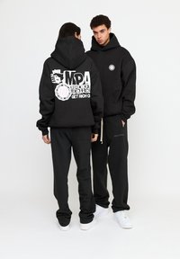 Multiply Apparel SEPERATION - Jersey con capucha - black soda washed