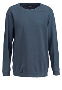 Felpa blu navy con maniche lunghe, scollatura a girocollo e polsini e orlo a coste. Realizzata in un materiale morbido con una superficie liscia.