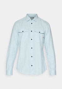 Unselected, light-blue denim