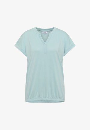 Blouse bleu clair à manches courtes avec col en V, ourlet élastique et étiquette de marque "Cecil" à l'intérieur du col.
