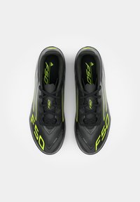adidas Performance F50 CLUB TF - Fodboldstøvler til kunstgræs - core black/iron metallic/lucid lemon